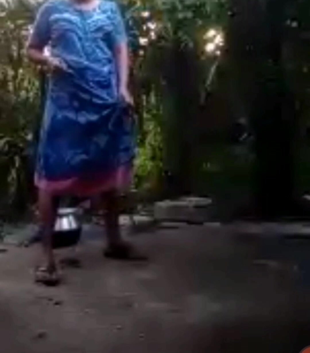 Desi aunty backyard standing pee