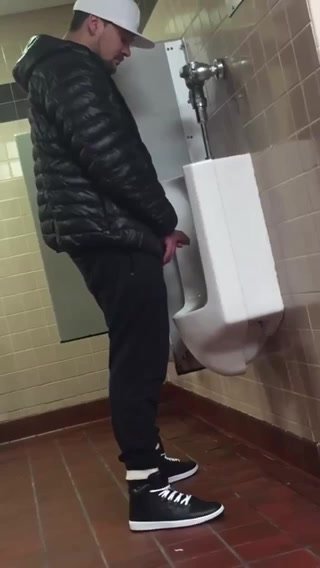 Huge Uncut cock at the urinals