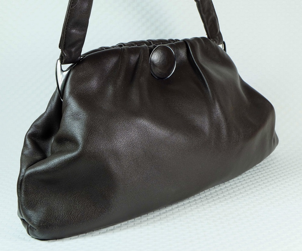cum in brown leather purse