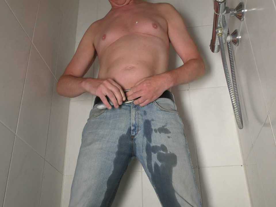 Man pissing in his jeans...