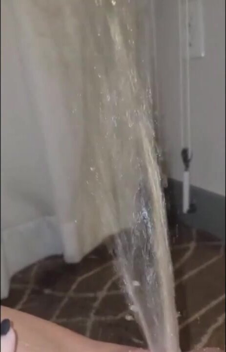 Spray marking her curtain