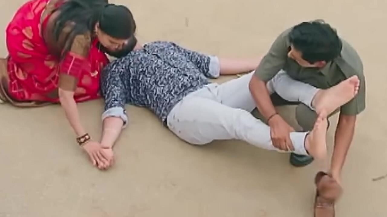 Rubbing the feet of an Indian actor