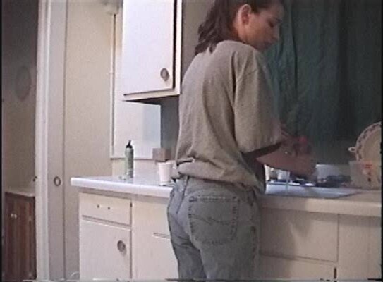 peeing doing dishes