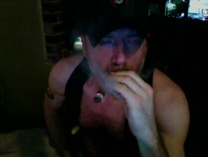 Hot fit silver stud smokes cigar and plays off cam