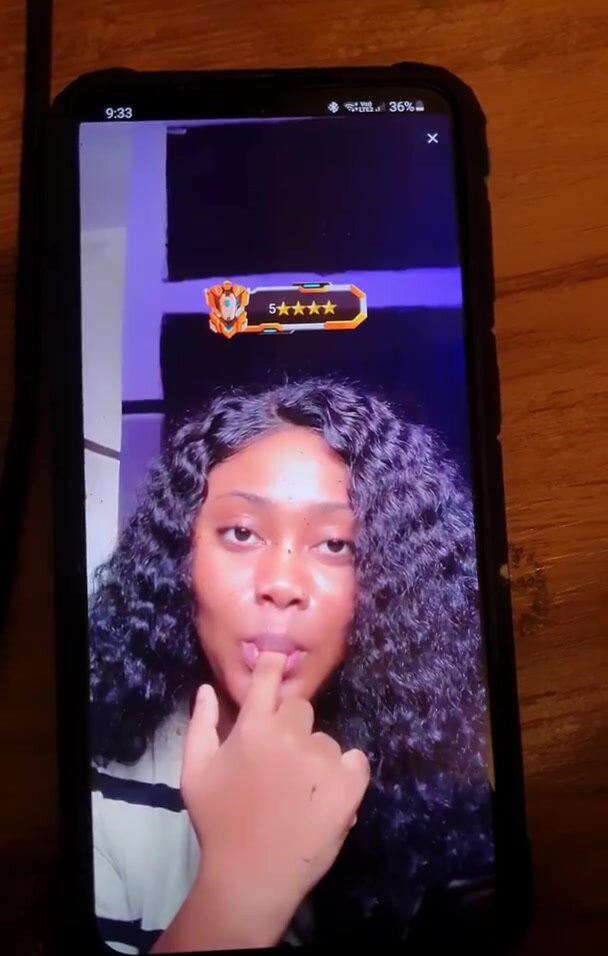 Hot Nigerian girl picks her nose and licks it