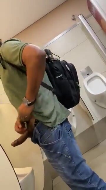 Horny daddy at the urinals
