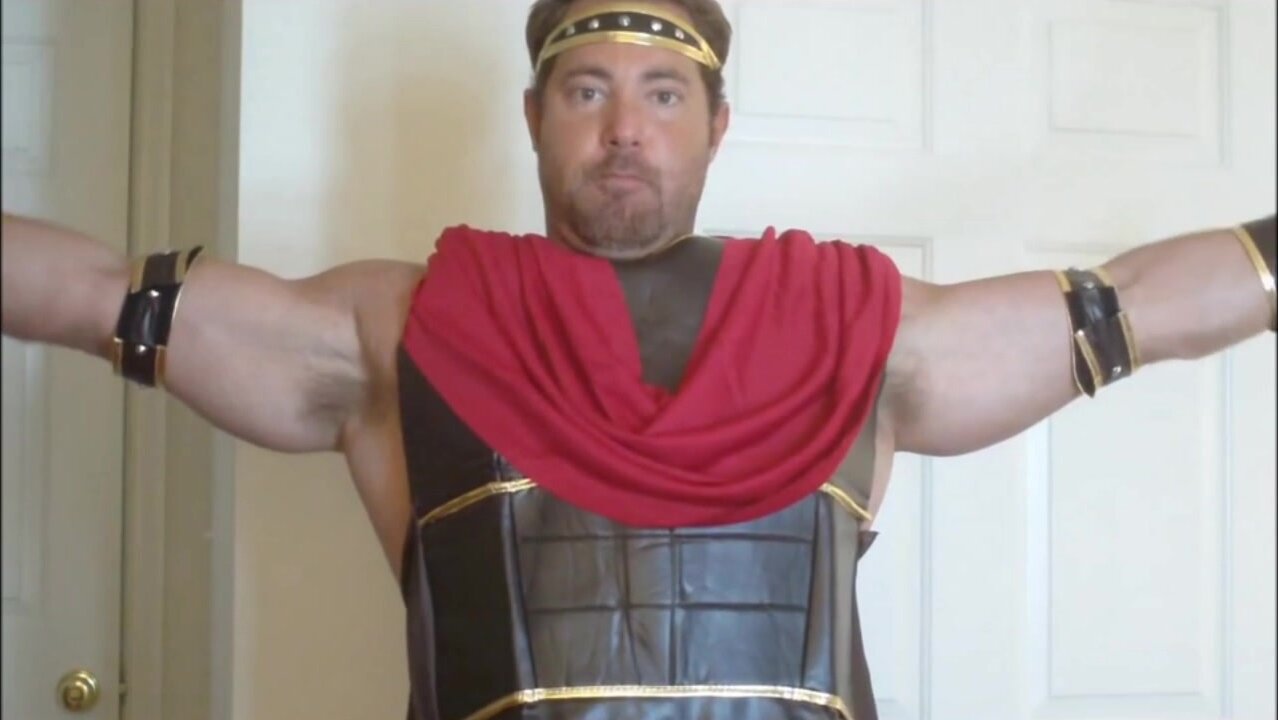 Tim Locke Ripping Shirts and Flexing in Costumes