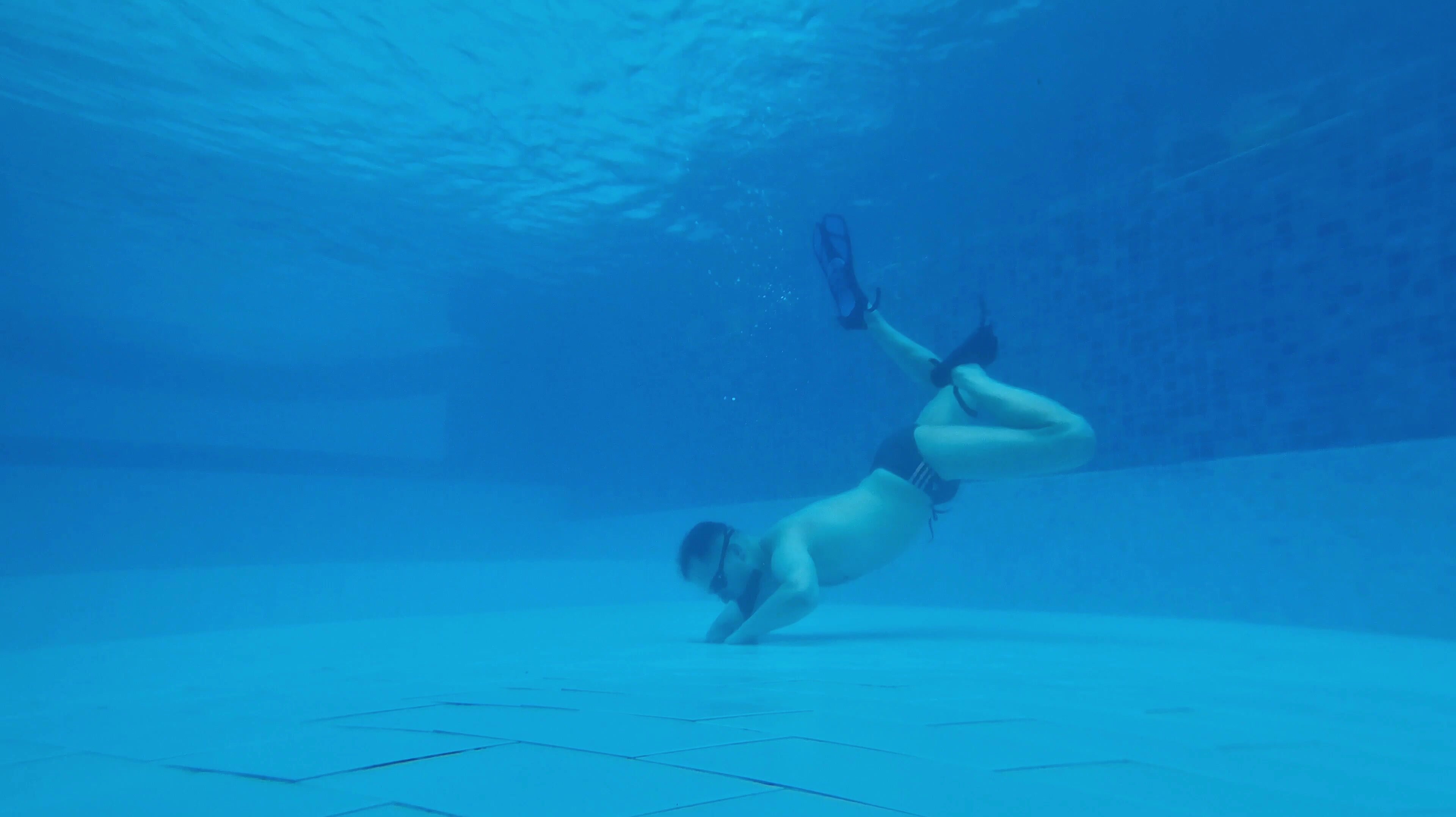 Pool Boy explores drain underwater