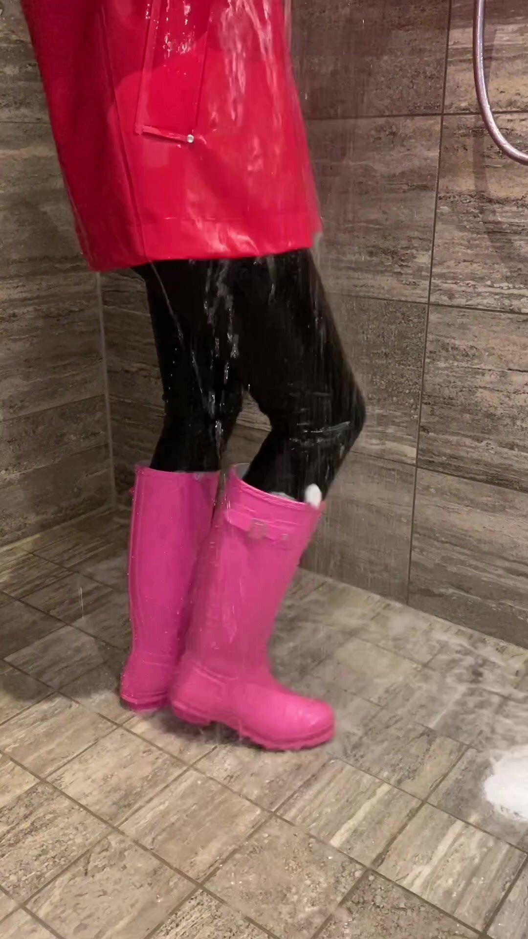 Shower in raincoat and  leather leggings