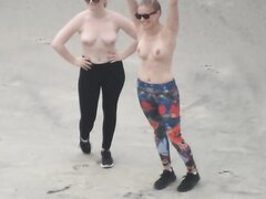 Girls take topless pic on nude beach