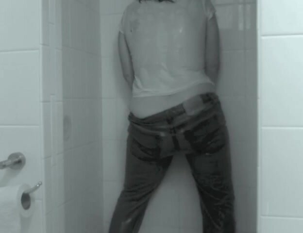 Steamy fun in the shower wearing jeans