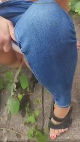 Married woman pees on a few bushes