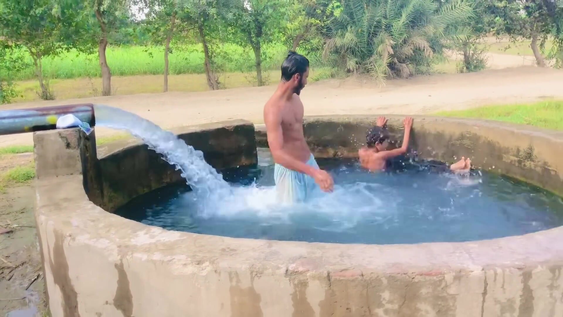 Paki boys in water, changing clothes, pissing (no nude)