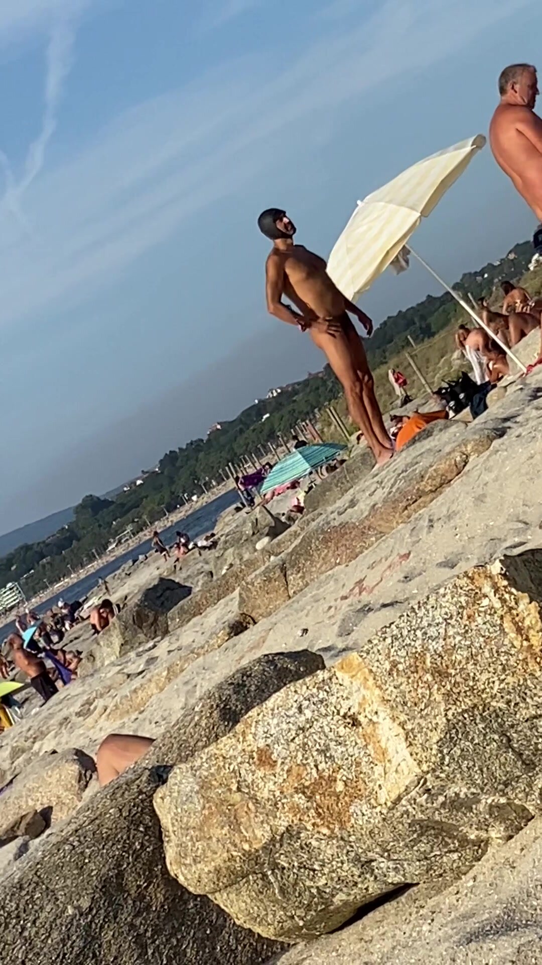 Nude guy at beach