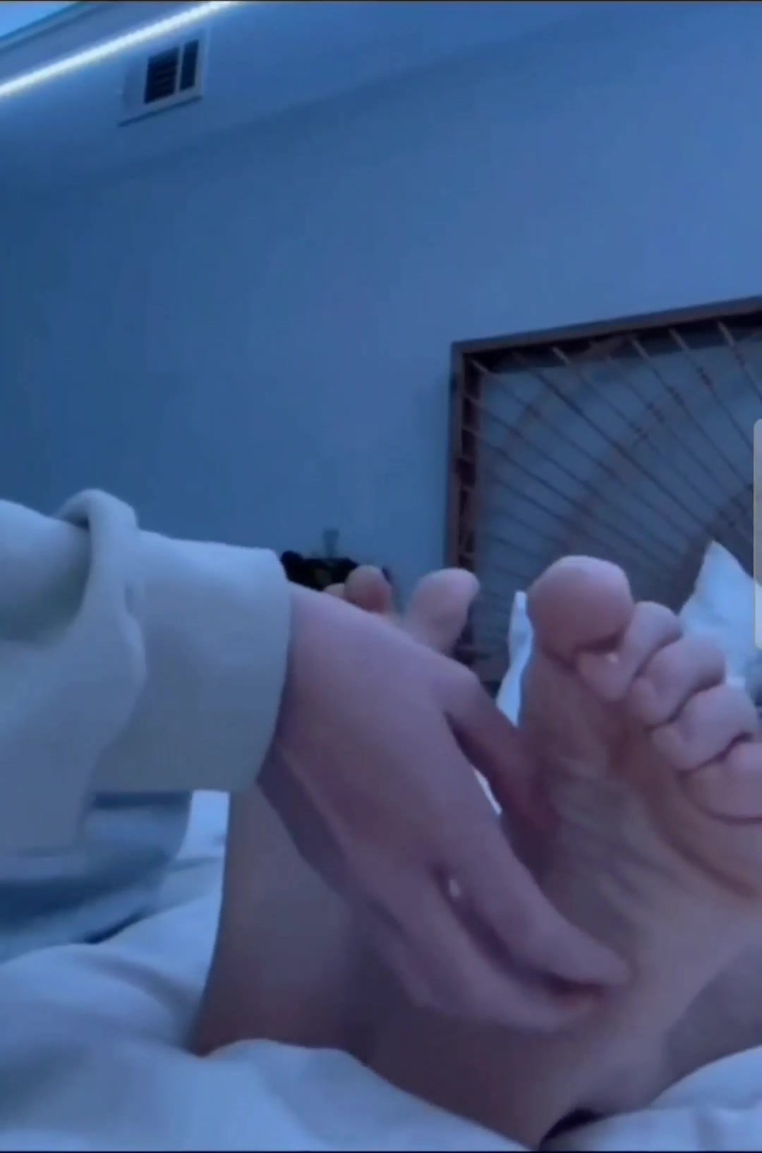 Boy feet tickled by girlfriend