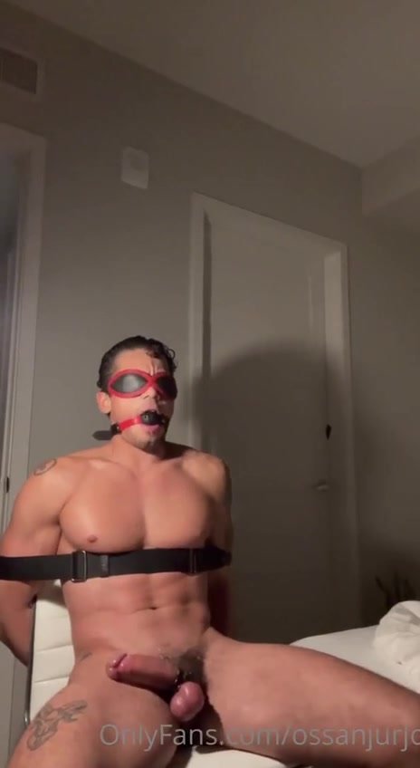 man tied to chair masturbating