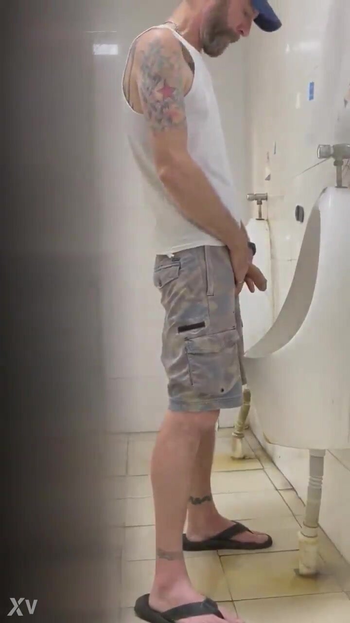 Beared daddy at swimming urinal