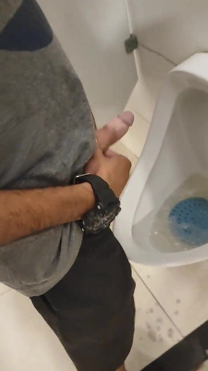 Spying cocks in public toilet
