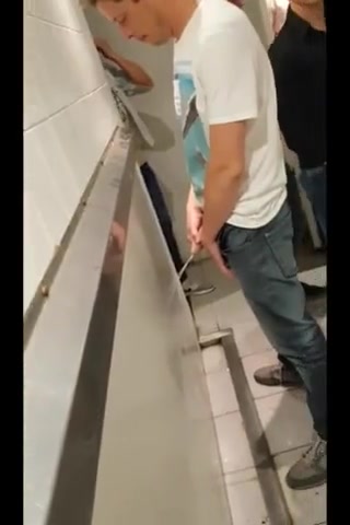 STRAIGHT GUYS PISSING AT THE BAR PART2