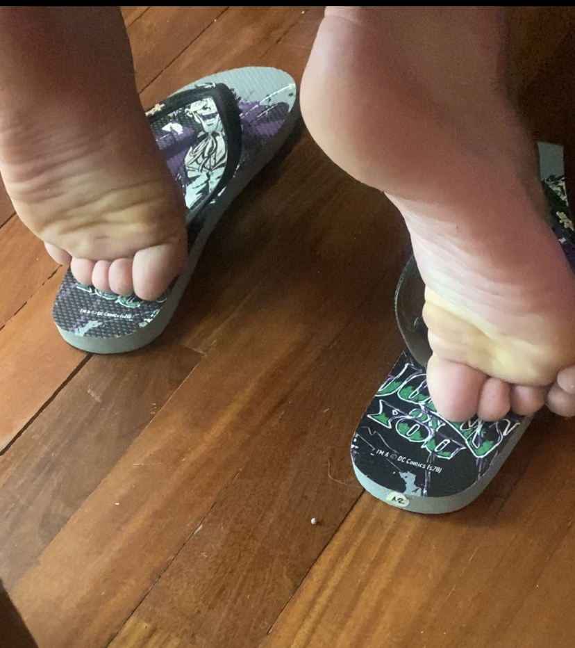 Flip flops shoeplay boy after The shower,candid feet