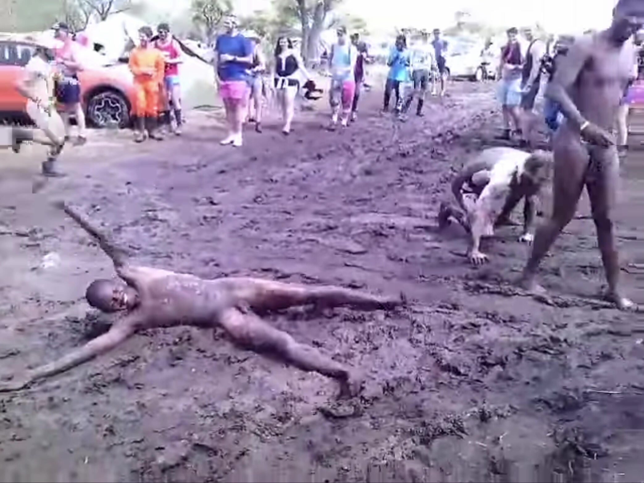 Naked Running Men Fall in Mud