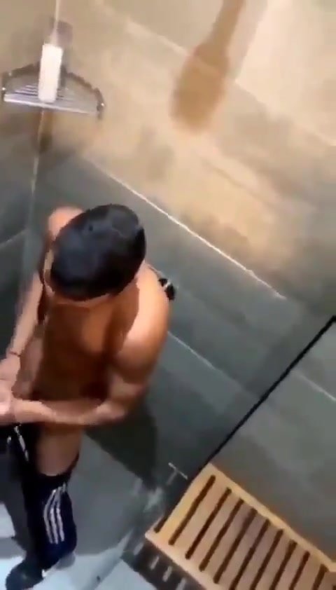 Jerking off together in a stall