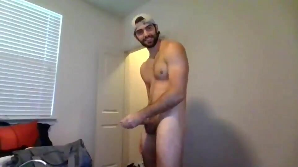 Handsome bearded guy flaunts naked on cam