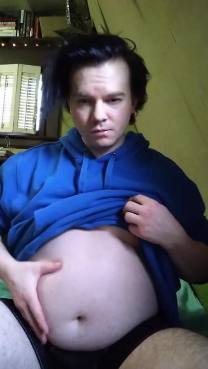 Fat boy plays with his belly - video 2