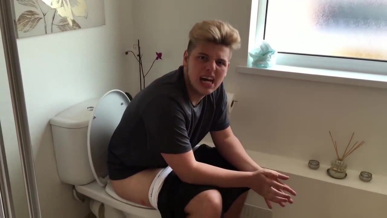 Naked guy on the toilet