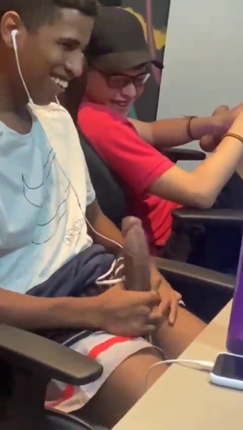 Boy showing his massive cock to friends on cyber cafe