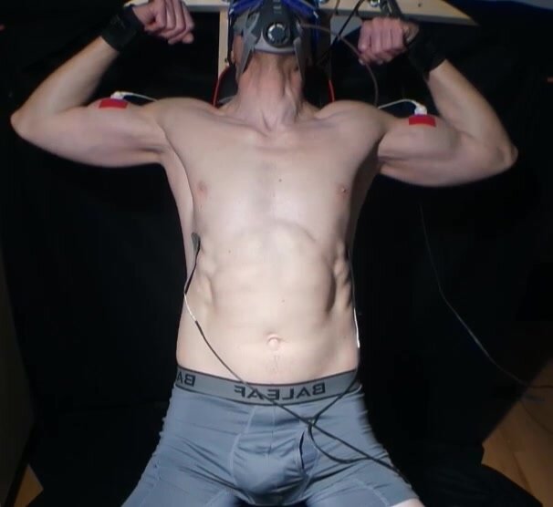 ... electrostimulated biceps and abs flex, -no nude-