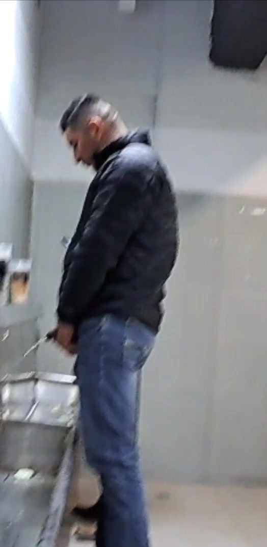 big guy pissing