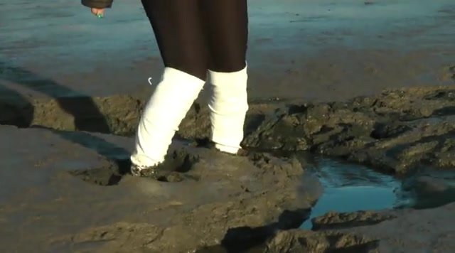 White Boots in Mud