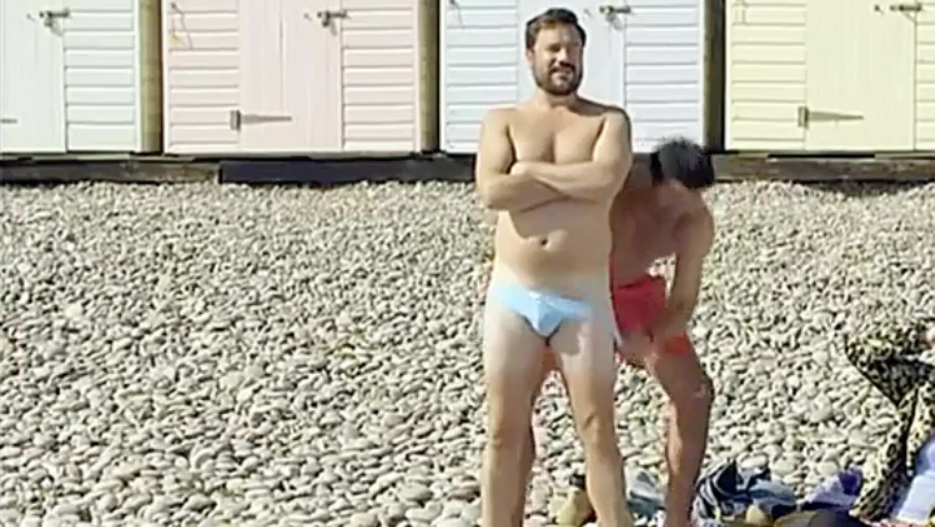 Guy Gets Stripped On A Beach