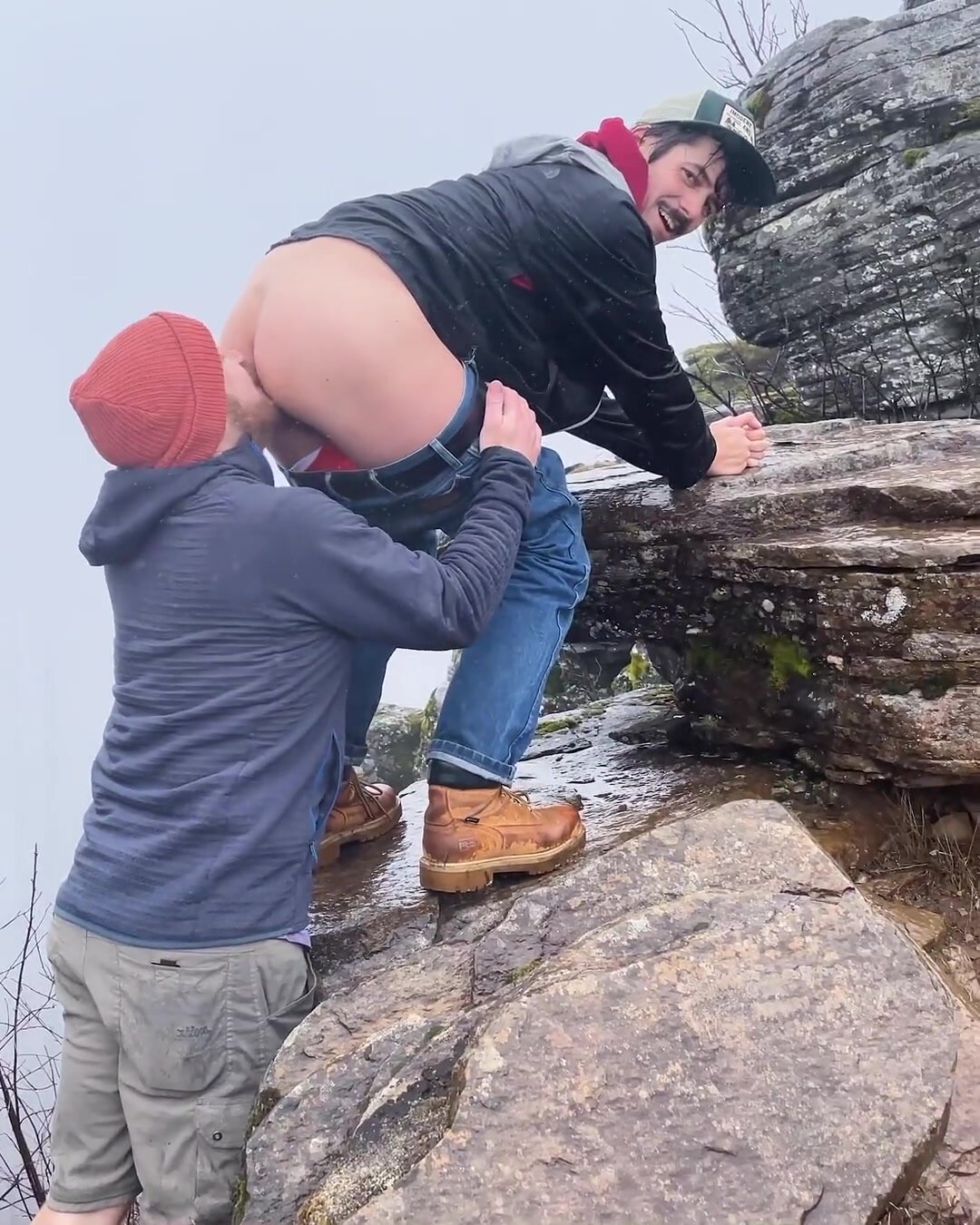 Redneck guy gets rimmed outdoors in the cold by his bro