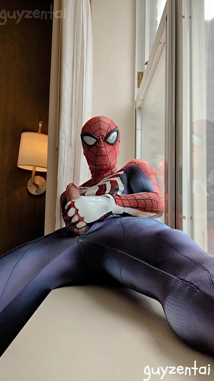 spiderman jerks off for city from hotel window