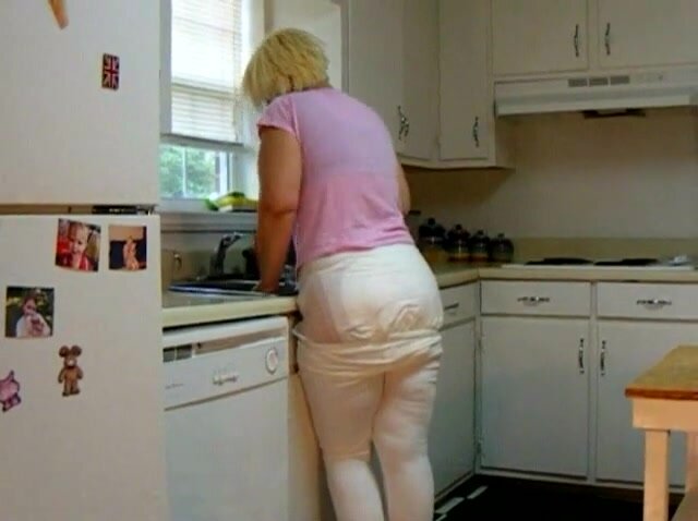 Pooping a diaper in the kitchen..