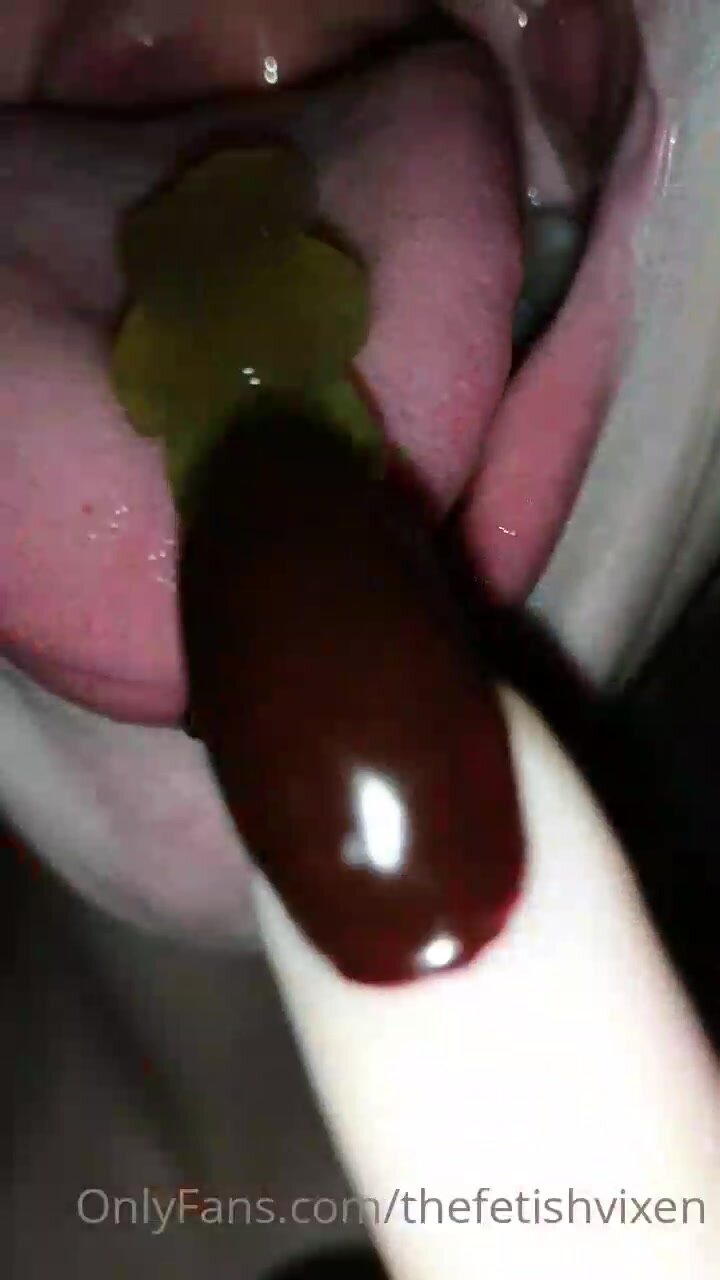 girl swallowing gummy - video 2