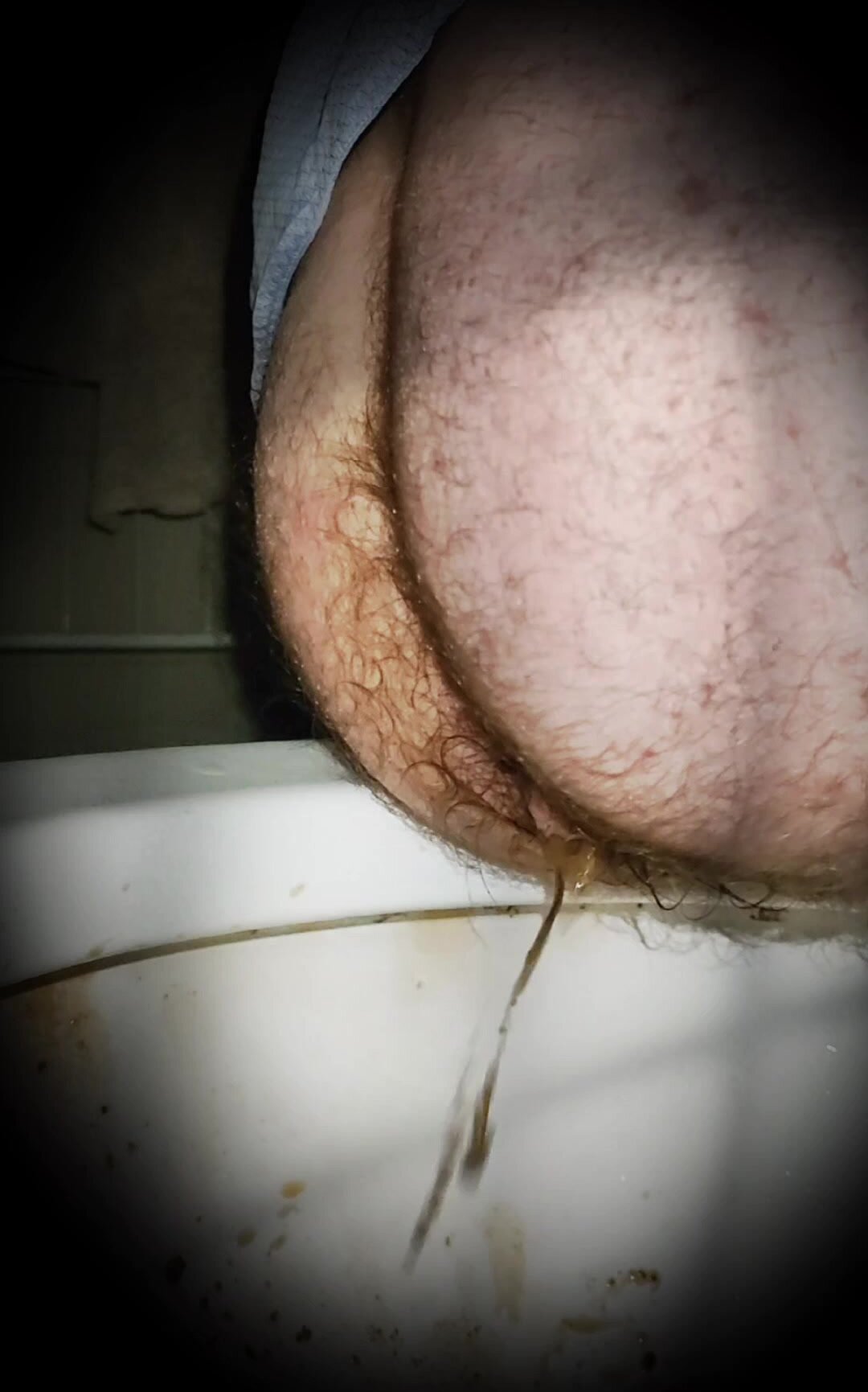 Diarrhea peeking men's bathroom