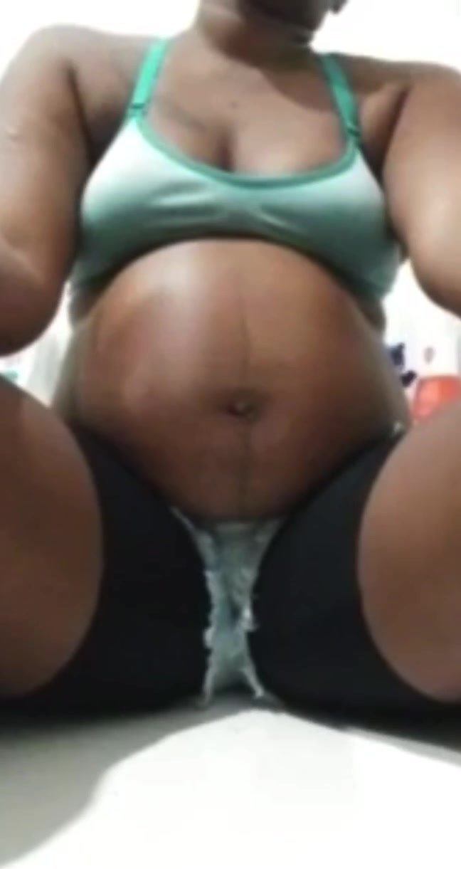 Pregnant ebony pissing