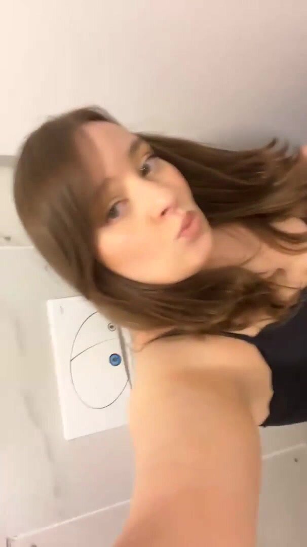 Busty Girl using the toilet