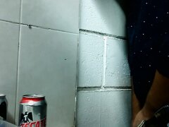 Bearded Guy pissing in front of other guys