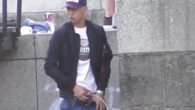 A guy pissing in public