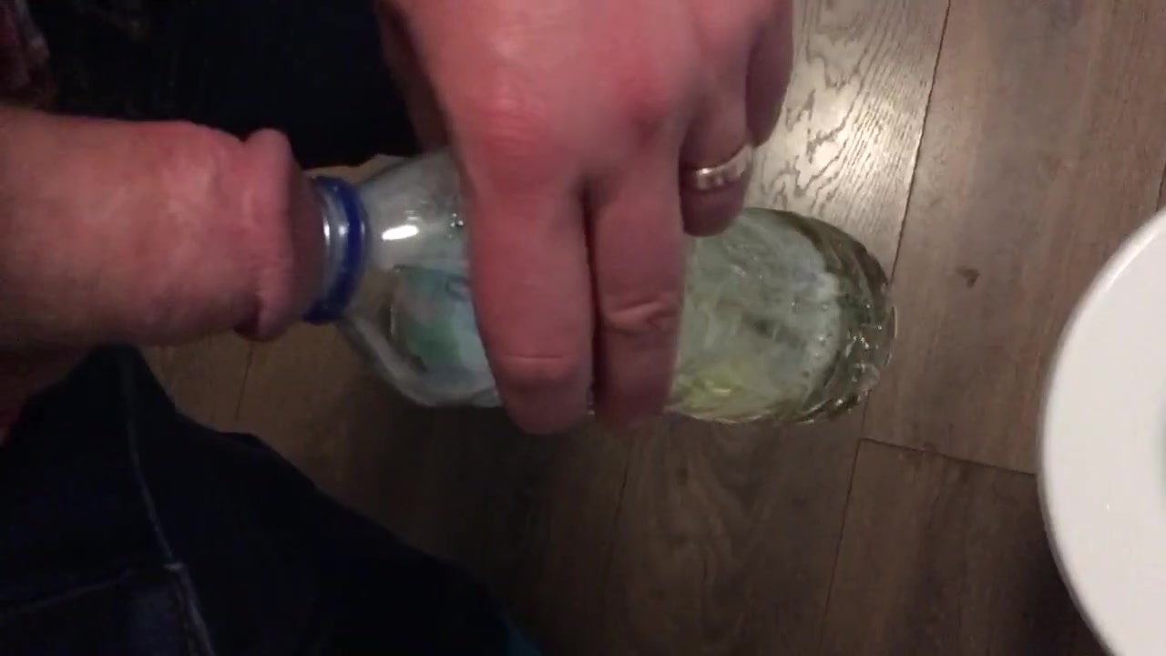 Pissing in a bottle - video 2