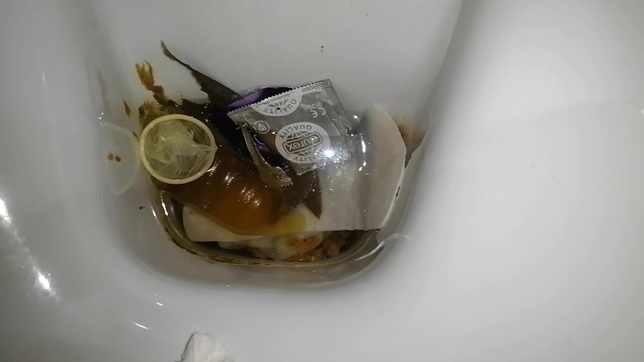 condom, pantyliner and trash flushed