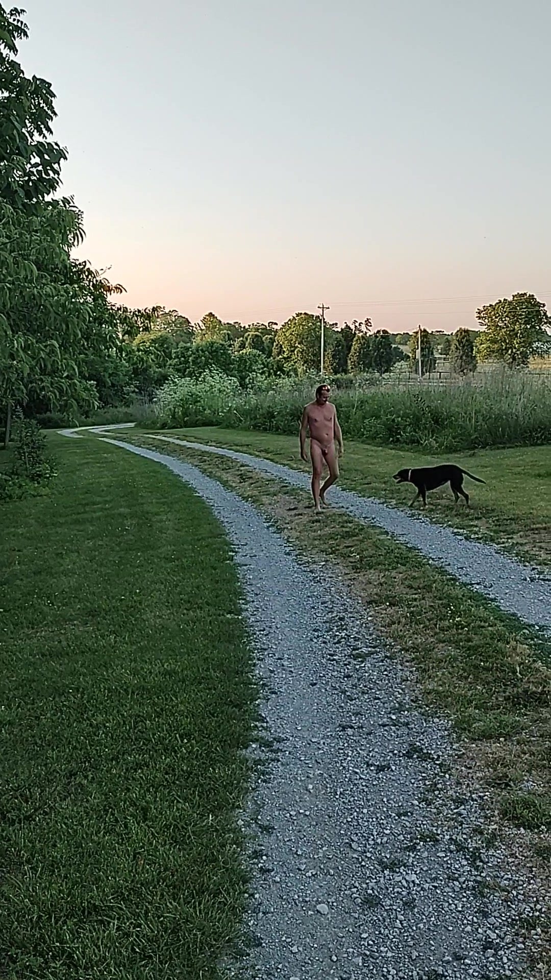 Nudist man walking
