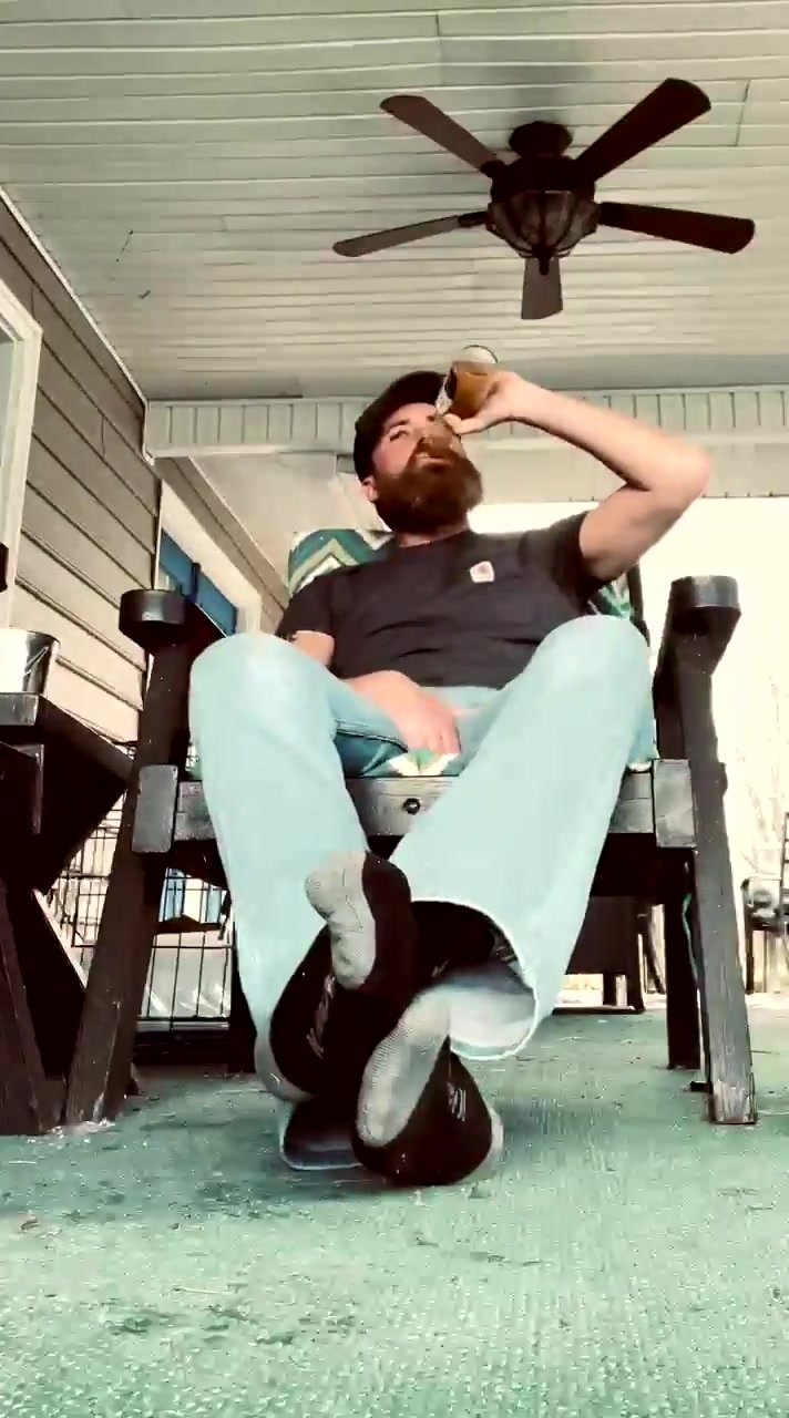 Str8 alpha redneck takes off his boots and swigs a beer