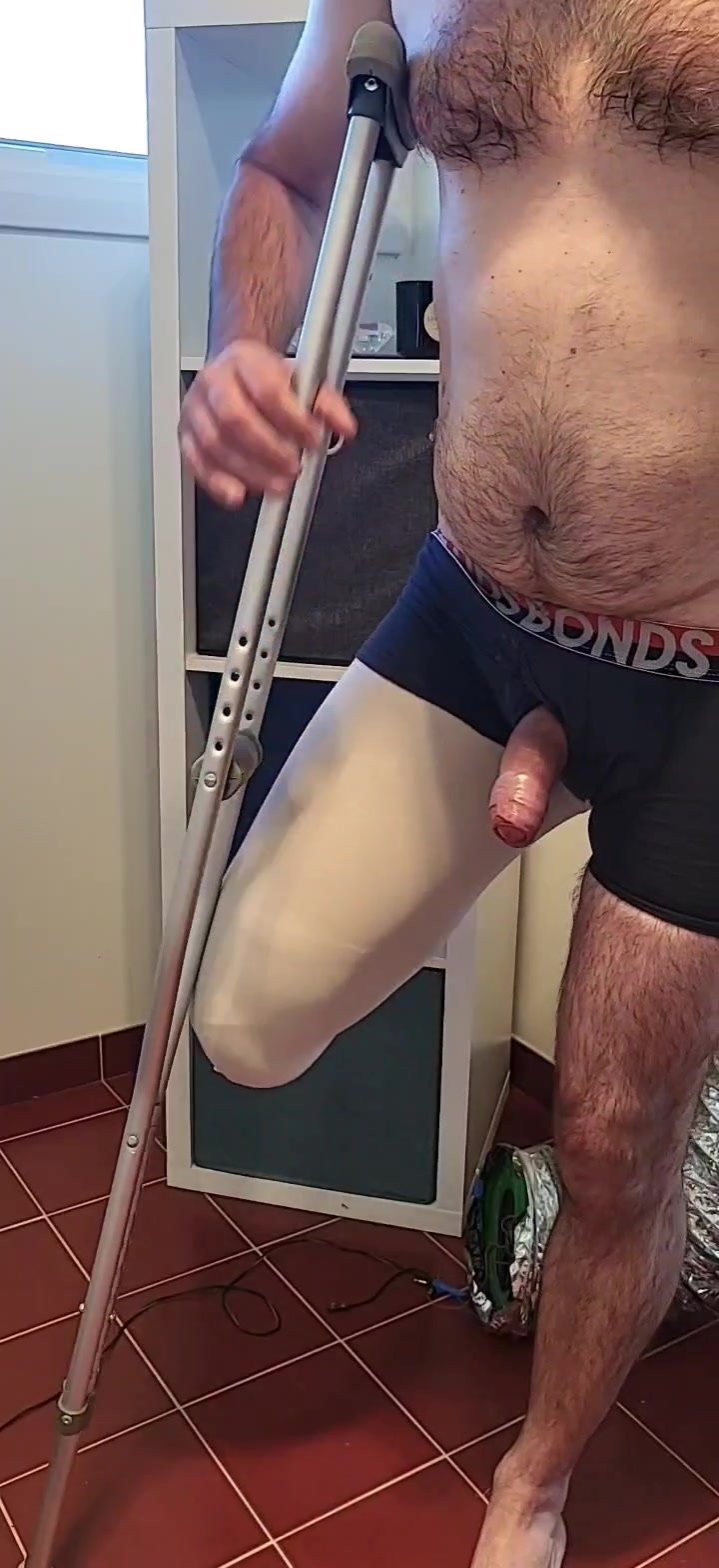 Amputee pretender masturbates with his crutch