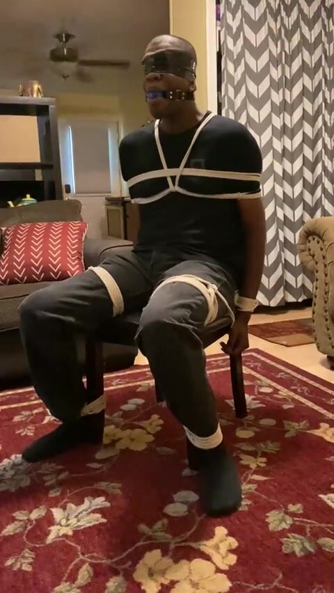 Bound and gagged in a chair