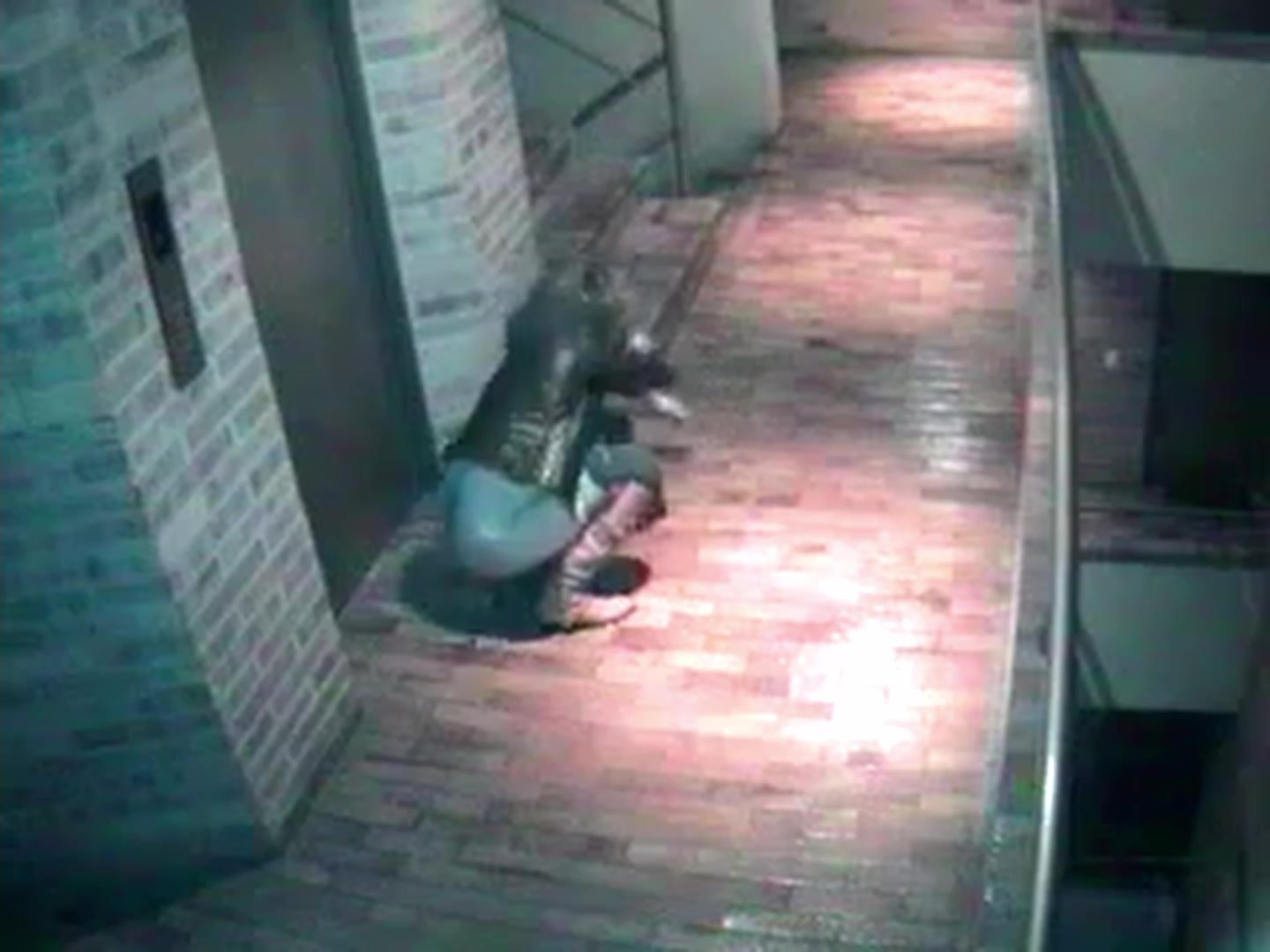 Drunk woman pissing in hallway